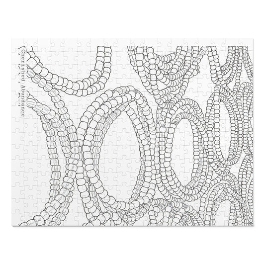 Color in Pieces Jigsaw Puzzle with Tin (Image: Bracelet Mounds)